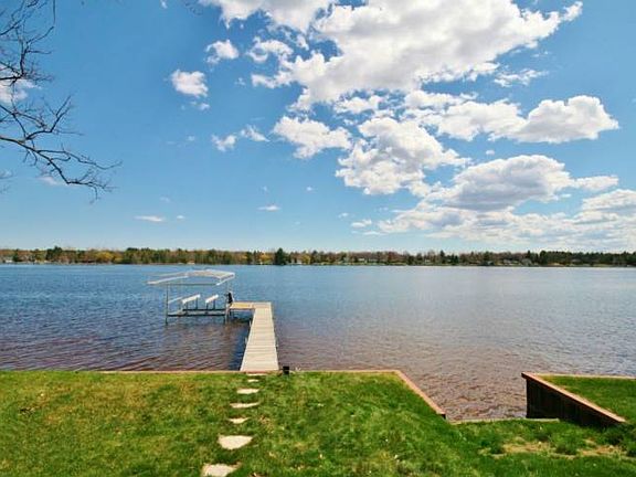 Our tour starts off with one of the best parts... the lake! All sports Wixom Lake is beautiful and exciting throughout the year creating years of wonderful memories. Sandy waterfront with knee high water that gradually drops down to diving depth at the end of the dock. The perfect waterfront!