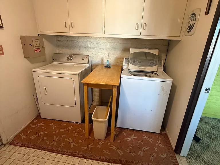 Washer, dryer, and folding table included.