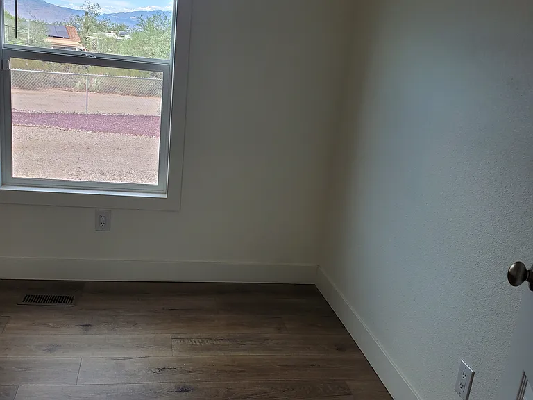 BEDROOM #2 LOOKING OUT WINDOW
