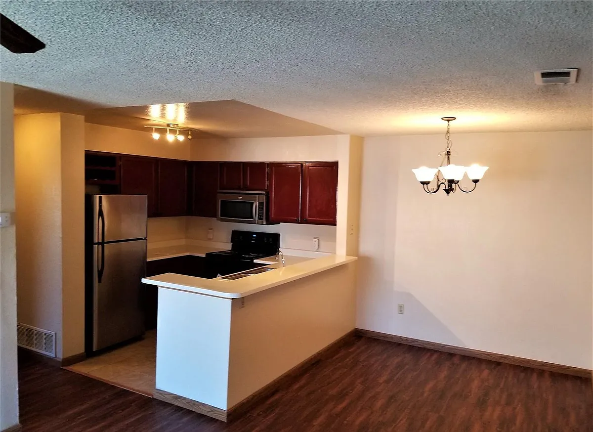 Building Photo - 4450 S Pitkin St #127