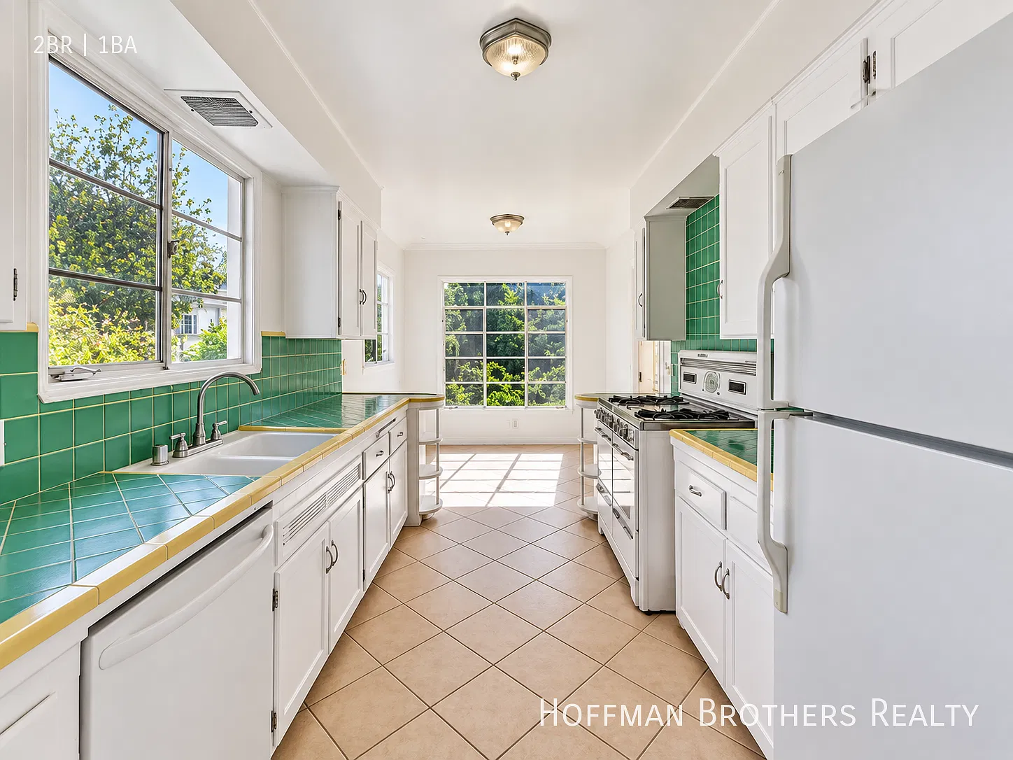 Rehabbed Home with Hardwood Floors, Dining Room, Updated Kitchen, In-Unit Laundry, A/C & Parking ... — Photo 2