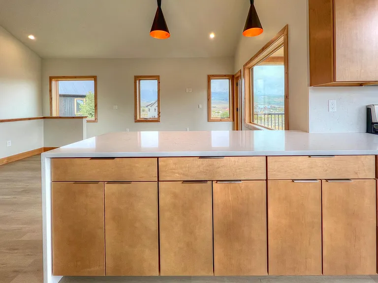 Beautiful cabinets, pull out shelving with soft-close. Views looking to the south views.