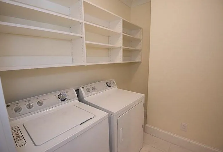 Washer and dryer in a separate room