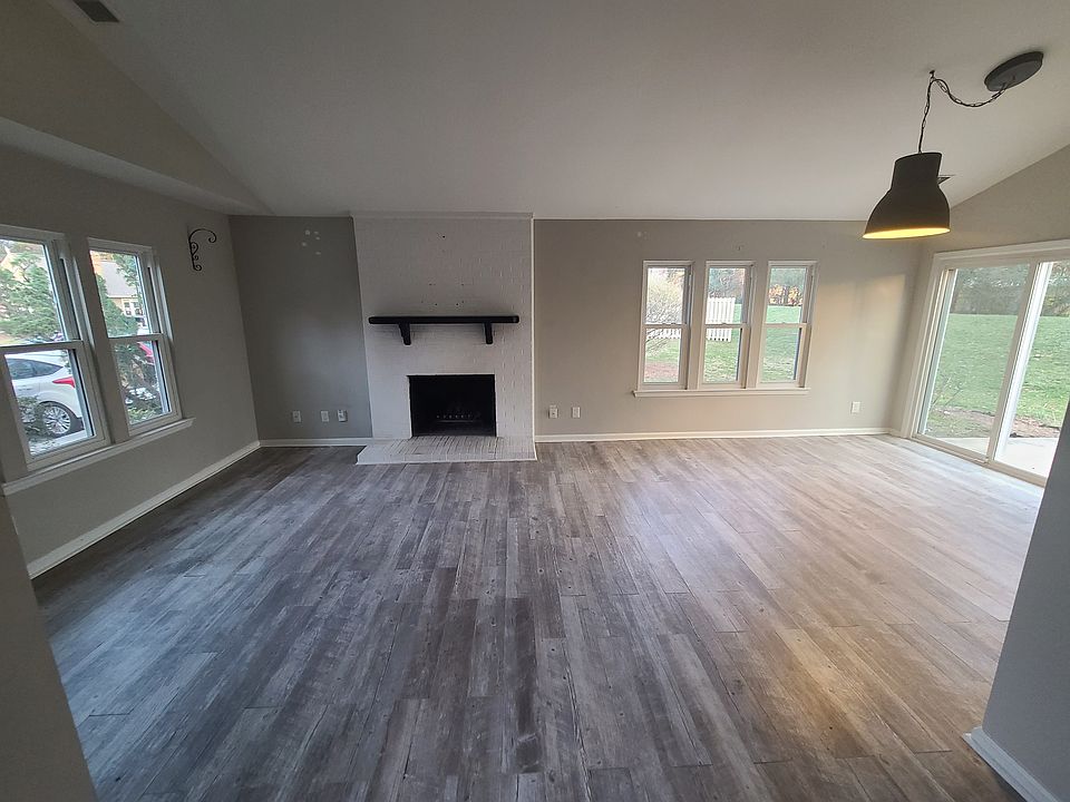 Open concept living room and dining room. With cozy working fireplace!