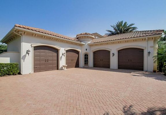 Home For Sale In Old Palm Golf Club