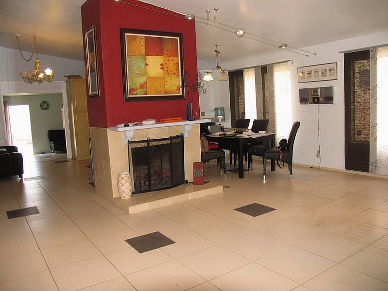 entrance leads to the living room/dining area
