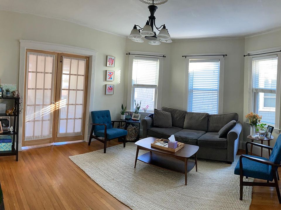 Living room with bay windows