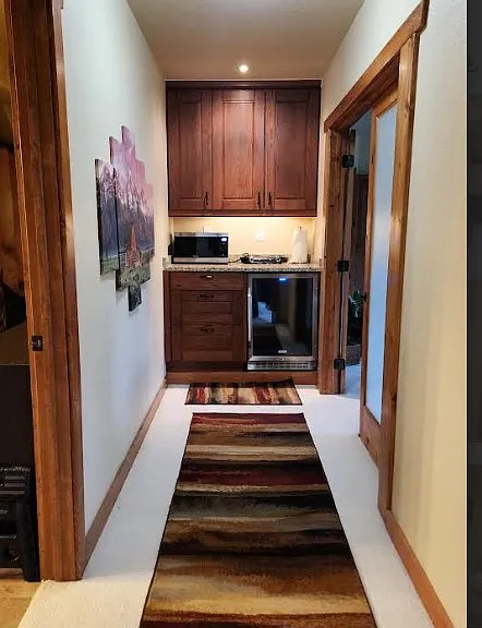 Kitchen area bathroom entrance on left