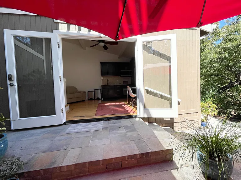 French Doors (fully opened) between studio and outdoor patio.
