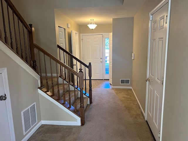 open stair in entrance foyer