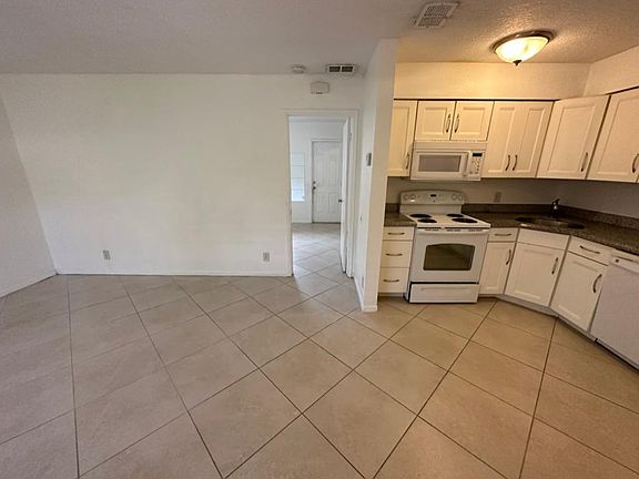 Taken from Front Door, Kitchen and Living room into bedroom