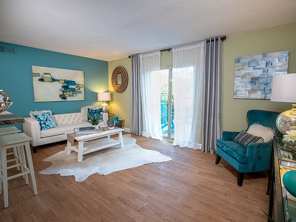 Large living room with private patio access