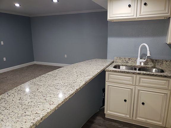 2nd image of 21329 E 50th Ave Unit Basement