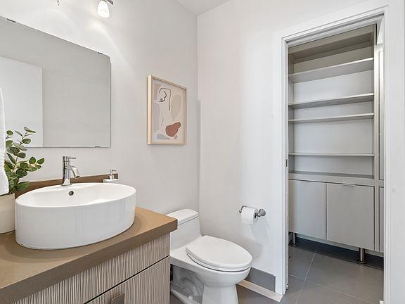 Half bathroom and storage area on the 2nd floor