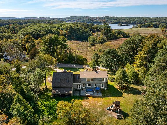 Aerial view of house & water