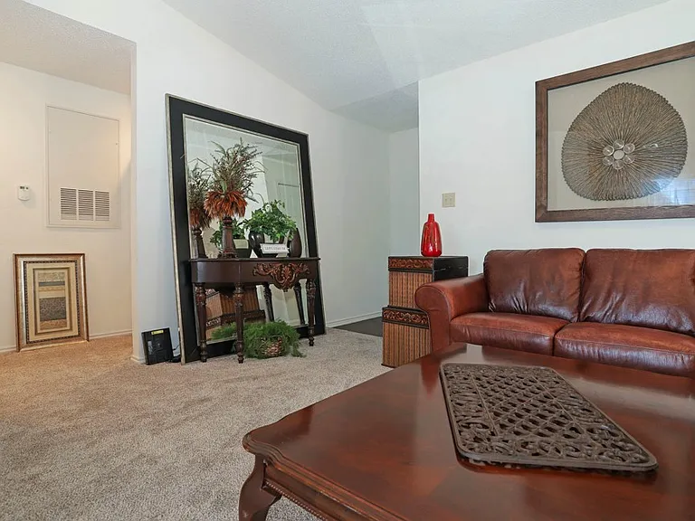Open-concept dining and living space designed for both relaxation and entertaining