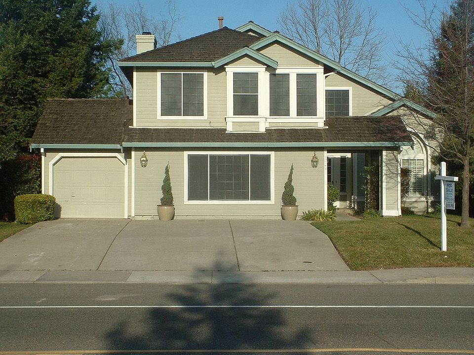 This home has a view of the beautiful park just accross the street