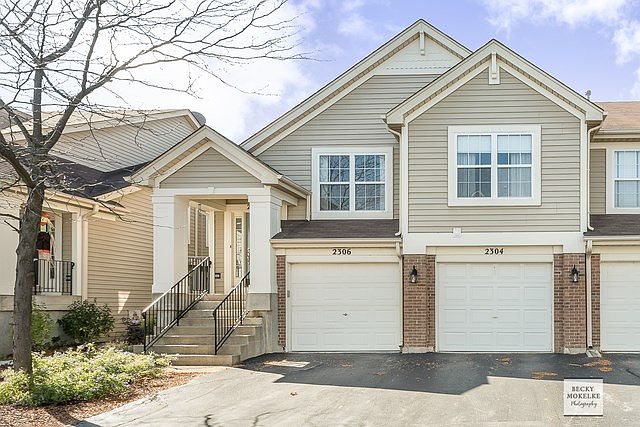 Exterior Front ~ 1 car garage ~ private entrance into the unit