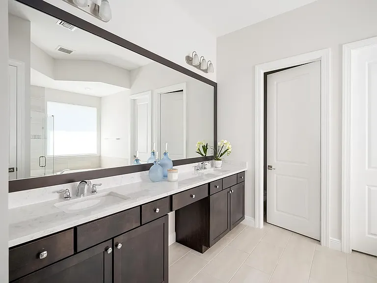 Master bathroom with double sinks.