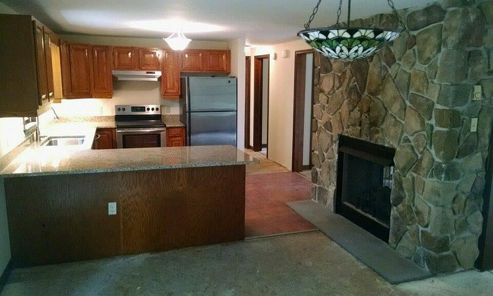 Kitchen with double sided fireplace