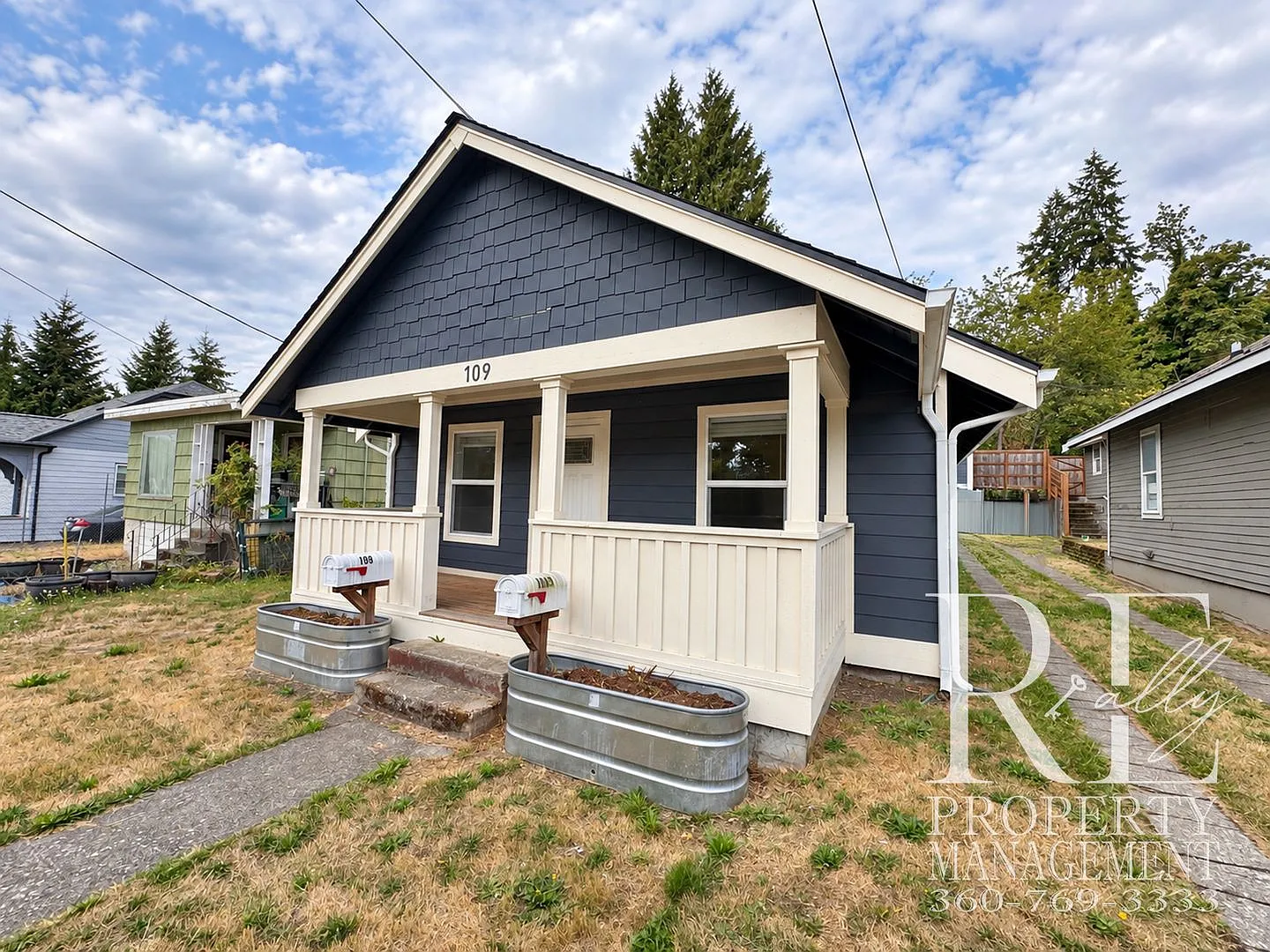 Light, Updated Wycoff St Home with Exceptional Storage, Garage & Covered Porch — Photo 1