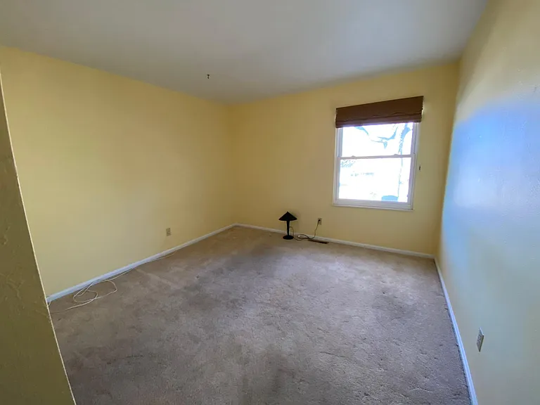 #1 upstairs bedroom. Carpet looks dirty in this picture but it really does not look that bad. We are getting it cleaned.