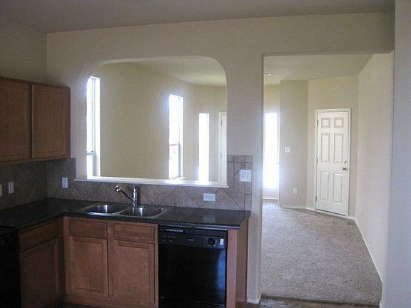 Kitchen opens to family room for a more spacious feel