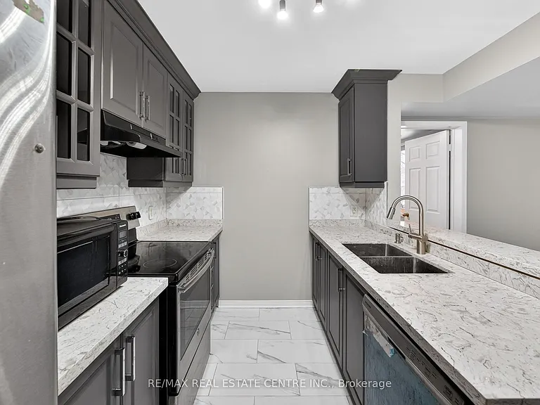 5035 Oscar Peterson Blvd #105 — Photo 13