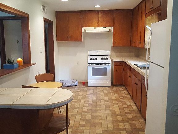 Large kitchen with breakfast bar/nook. Lots of cabinet space.
