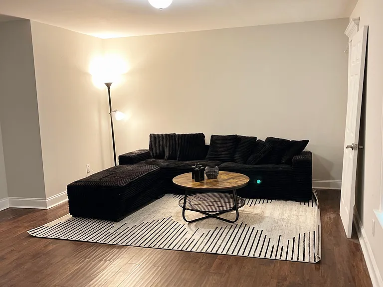 Cozy common area living room with TV.