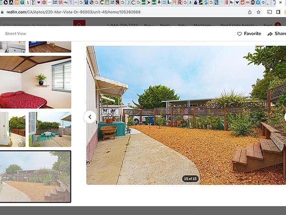 Left side yard, but view from the back of the mobile home.