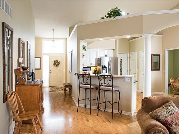 Open entry w/wood floors