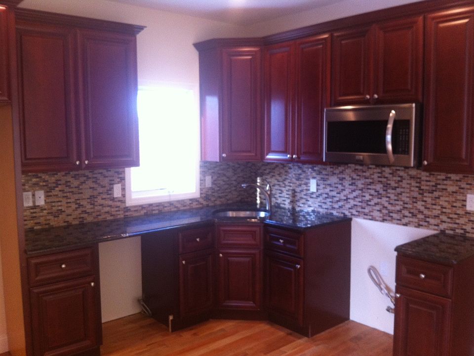 kitchen with granite tops hardwood floors