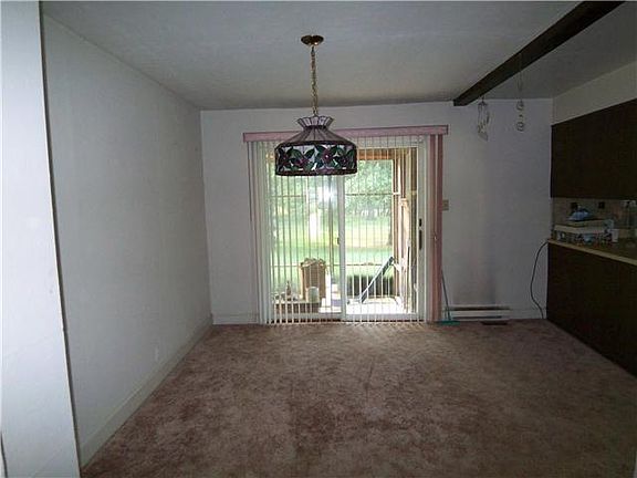 Dining Room with Sliders to screened porch.