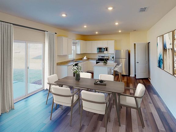Open floorplan makes the Osprey new home design perfect for entertaining - Model Representation