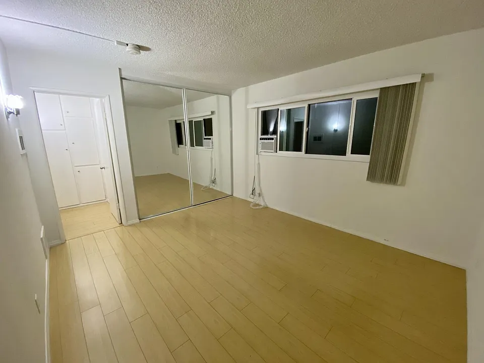Master bedroom w/ new A/C, window and mirrored closest
