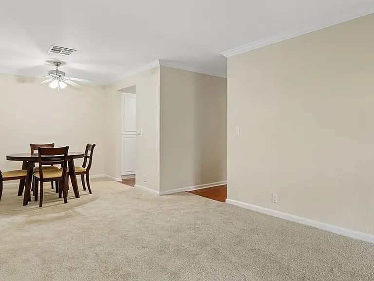 Open concept with adjoining dining area.