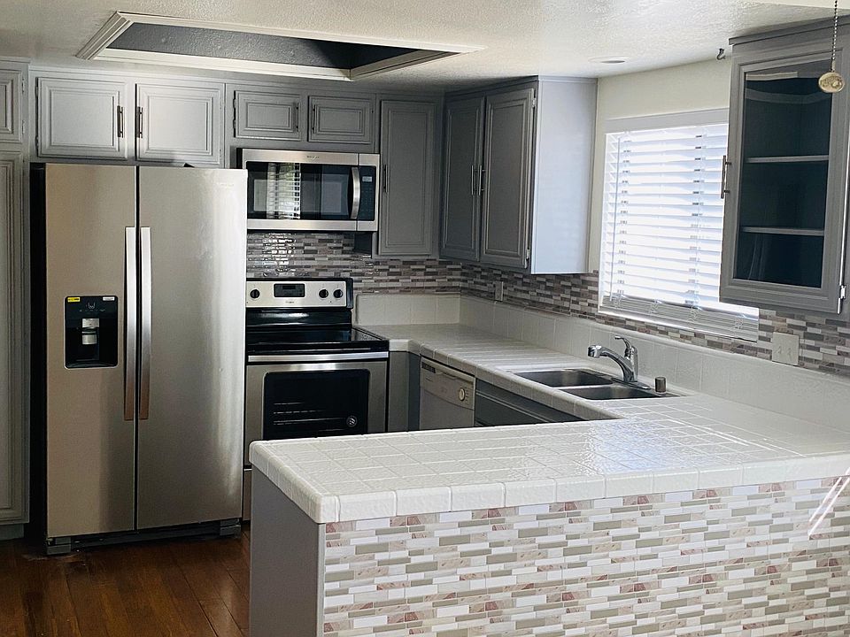 Beautifully upgraded open kitchen with lots of counter space and cabinets to make hosting very easy!