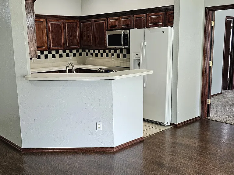 View into kitchen from living room