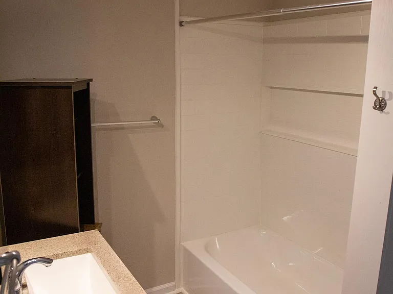 Master bathroom with brand new bathtub/shower.