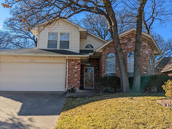 Two car garage. Yard maintained by professional landscapers so you don't have to! Large mature trees provide lots of shade for those hot days.