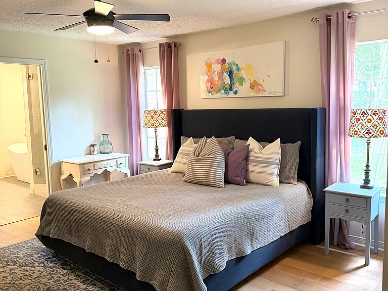 Master bedroom with en-suite bathroom and walk-in closet