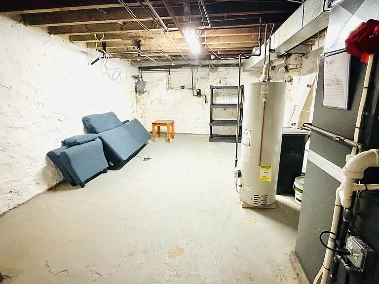 Full basement with concrete floor, ample storage space, water heater, and HVAC system _ great for storage.