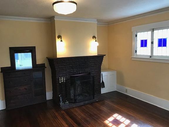 Dining room with fireplace and built-ins