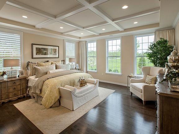 Primary bedroom with two walk-in closets