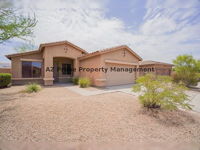 17633 W Wind Song Ave — Photo 1