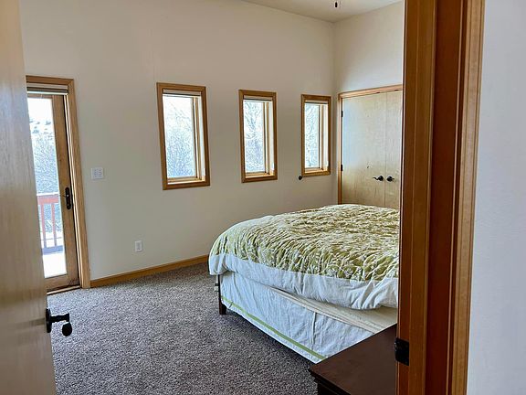 Master bed room connected to a balcony