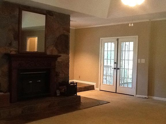 Great room has access to screened porch and front porch