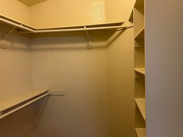 Walk-in closet from the master bathroom