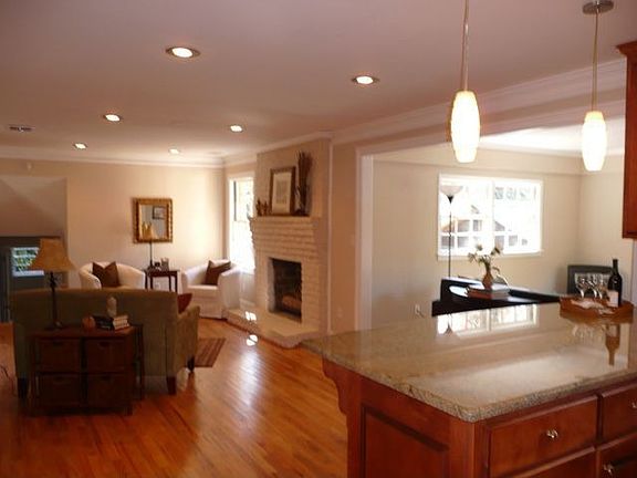 View from Kitchen to family room and sunroom